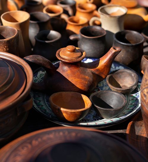 a-lot-of-handmade-pottery-ceramic-clay-brown-kitc-resize.jpg